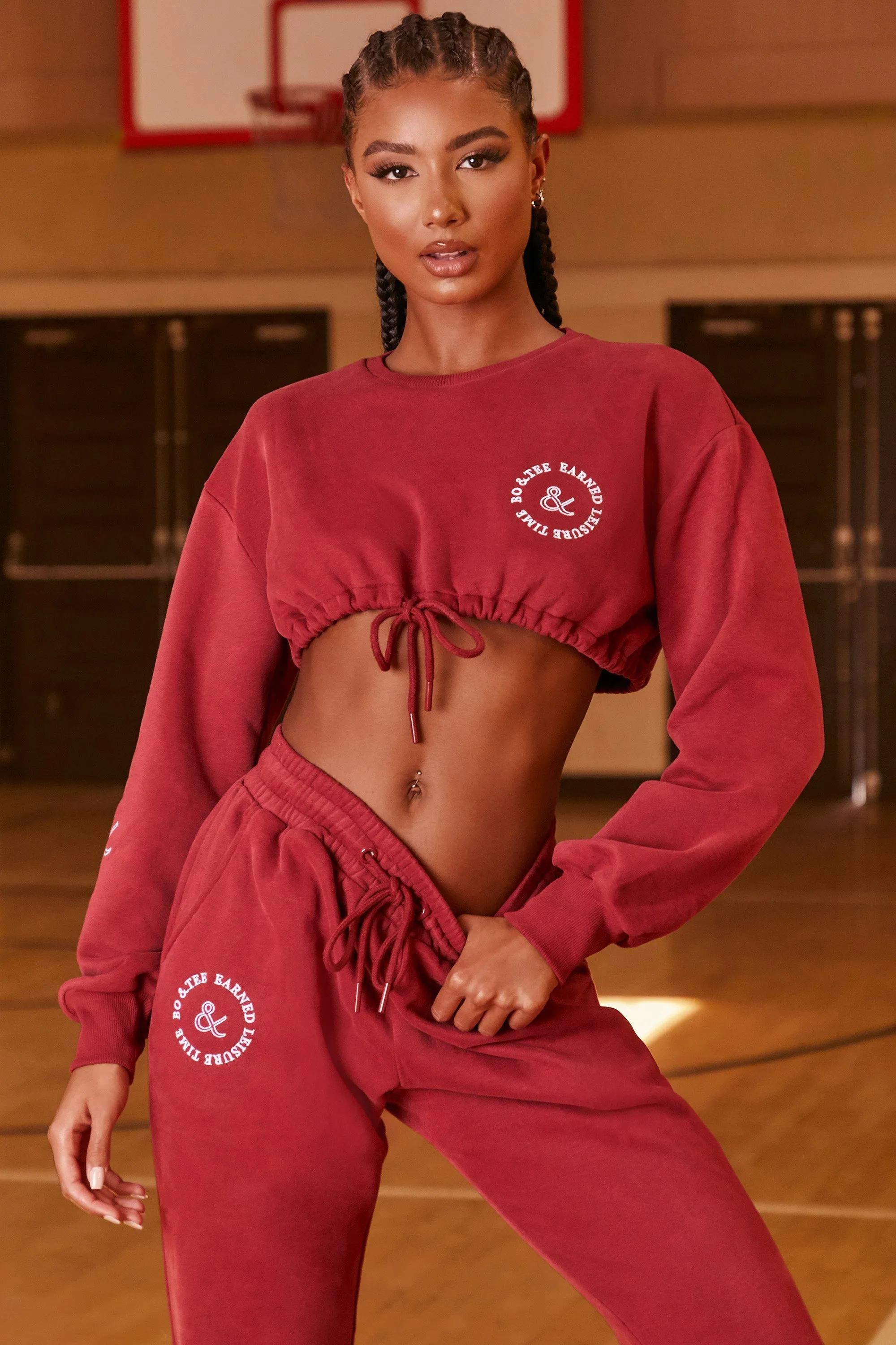 Keep Moving Cropped Drawstring Sweatshirt in Burgundy