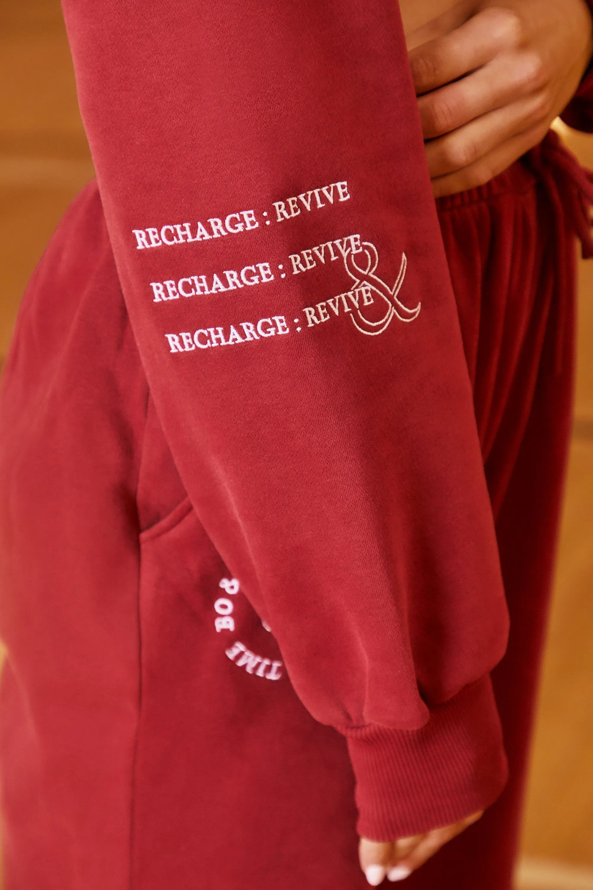 Keep Moving Cropped Drawstring Sweatshirt in Burgundy